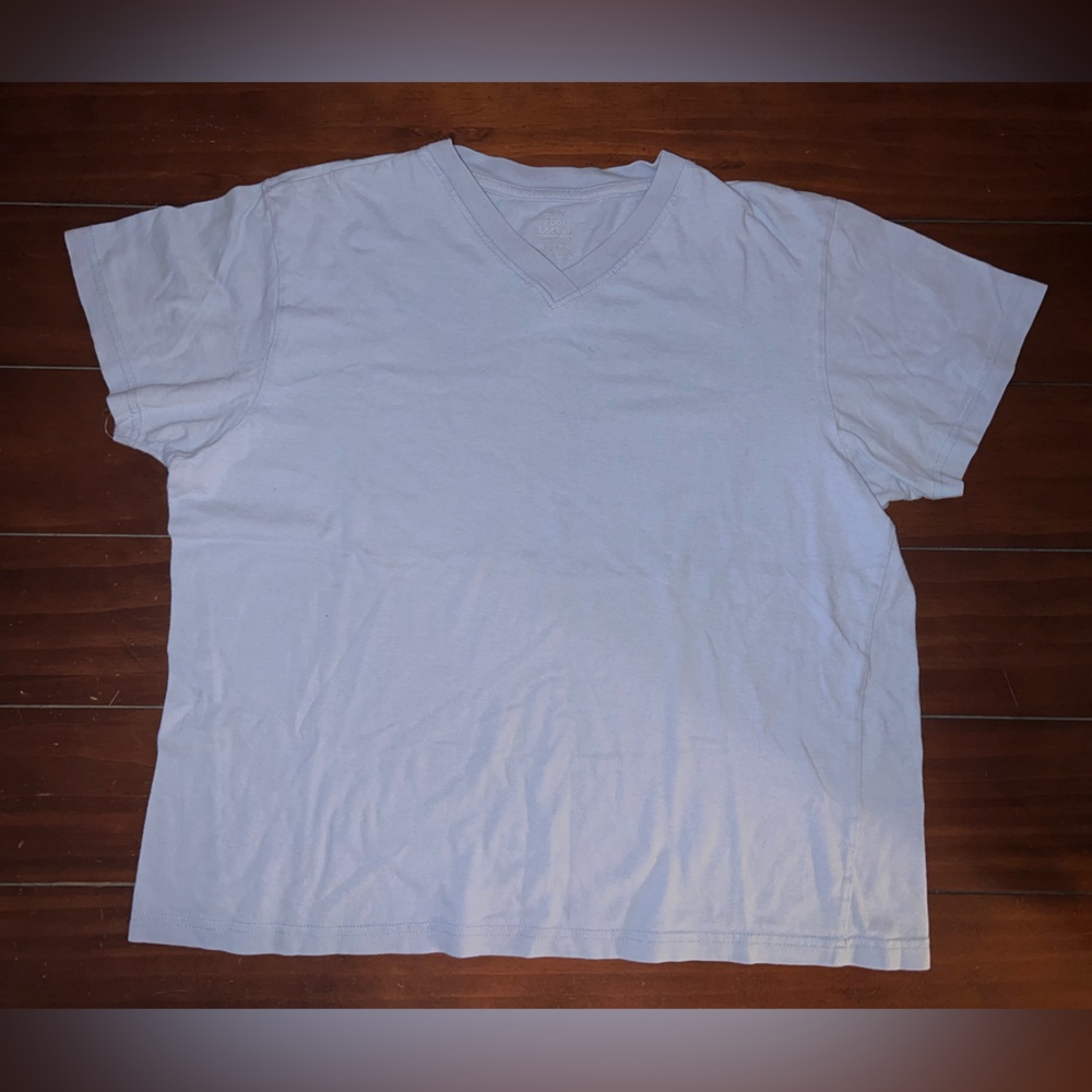 Lady foot locker light blue shirt size large. Like new only worn once!